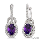 7x5 MM Oval Cut Amethyst and 1/3 Ctw Round Cut Diamond Earrings in 14K White Gold