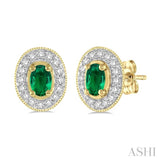 5x3 MM Oval Cut Emerald and 1/4 Ctw Round Cut Diamond Earrings in 14K Yellow Gold