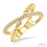 1/6 Ctw Crisscross Split Shank Round Cut Diamond Fashion Ring in 10K Yellow Gold