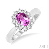 7X5mm Oval Shape Pink Sapphire and 1/3 Ctw Round Cut Diamond Ring in 14K White Gold