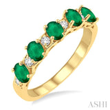 1/6 ctw Oval Shape 4X3MM Emerald and Round Cut Diamond Precious Band in 14K Yellow Gold
