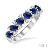 1/5 ctw Oval Shape 4X3MM Sapphire and Round Cut Diamond Precious Band in 14K White Gold